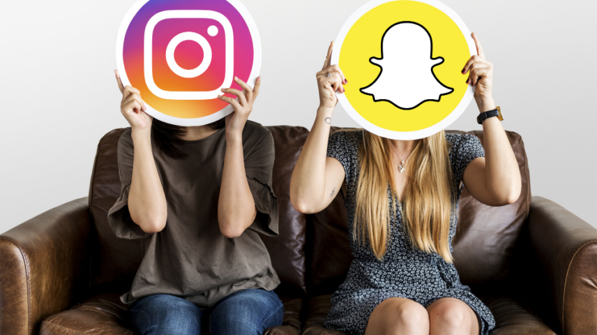 Women Holding Social Media Icons